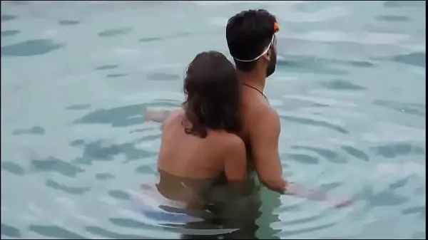 Girl gives her man a reacharound in the ocean at the beach - full video xrateduniversity. com Phim mới